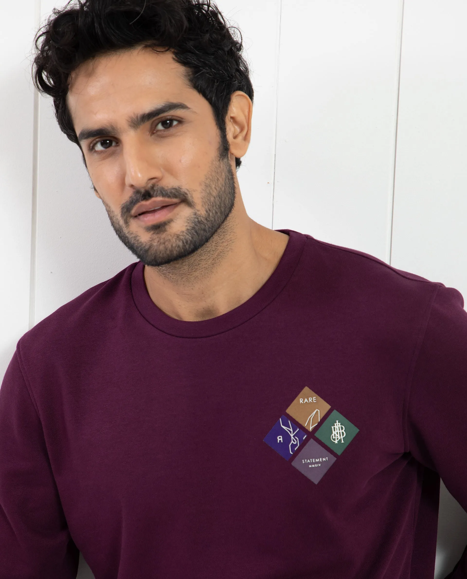 Rare Rabbit Men's Praise Maroon Cotton Polyester Fabric Full Sleeves Graphic Branding Print Sweatshirt